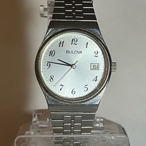 Bulova Mens 1980s steel analog quartz watch- runs, not well